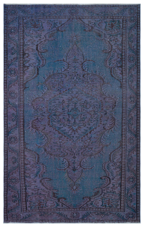 Load image 1 in gallery view. Deep blue and purple distressed traditional rug with a central floral medallion and ornate border.
