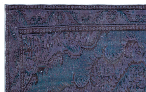 Load image 1 in gallery view. Deep purple and teal vintage-style rug with a distressed floral medallion pattern and a detailed border.