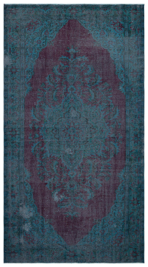 Load image 1 in gallery view. Deep purple and teal distressed traditional rug with a central floral medallion and ornate border.