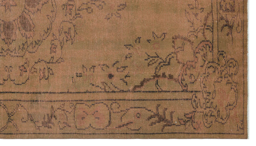 Load image 1 in gallery view. Brown traditional rug with a faded black floral and vine border pattern.