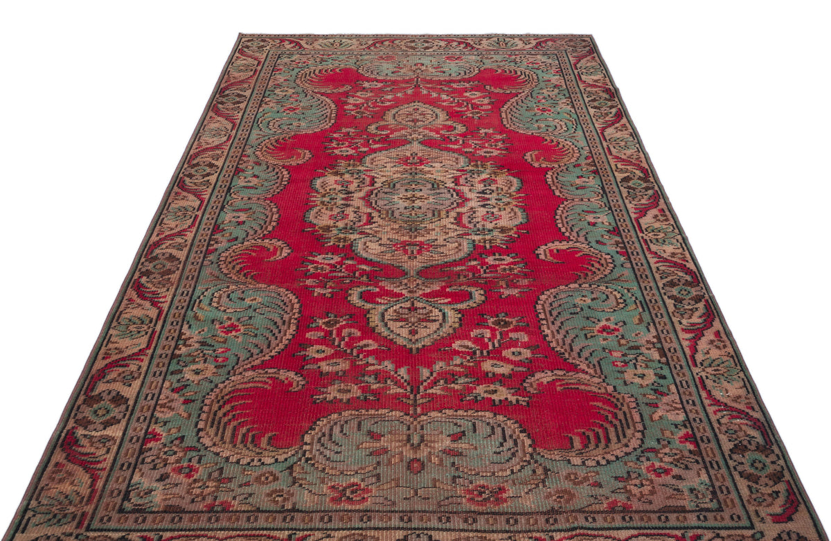Red and teal traditional Persian-style rug with a central floral medallion and ornate border on a white background.