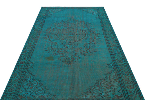 Load image 1 in gallery view. Teal and black distressed vintage-style rug with a central medallion and ornate border pattern on a white background.