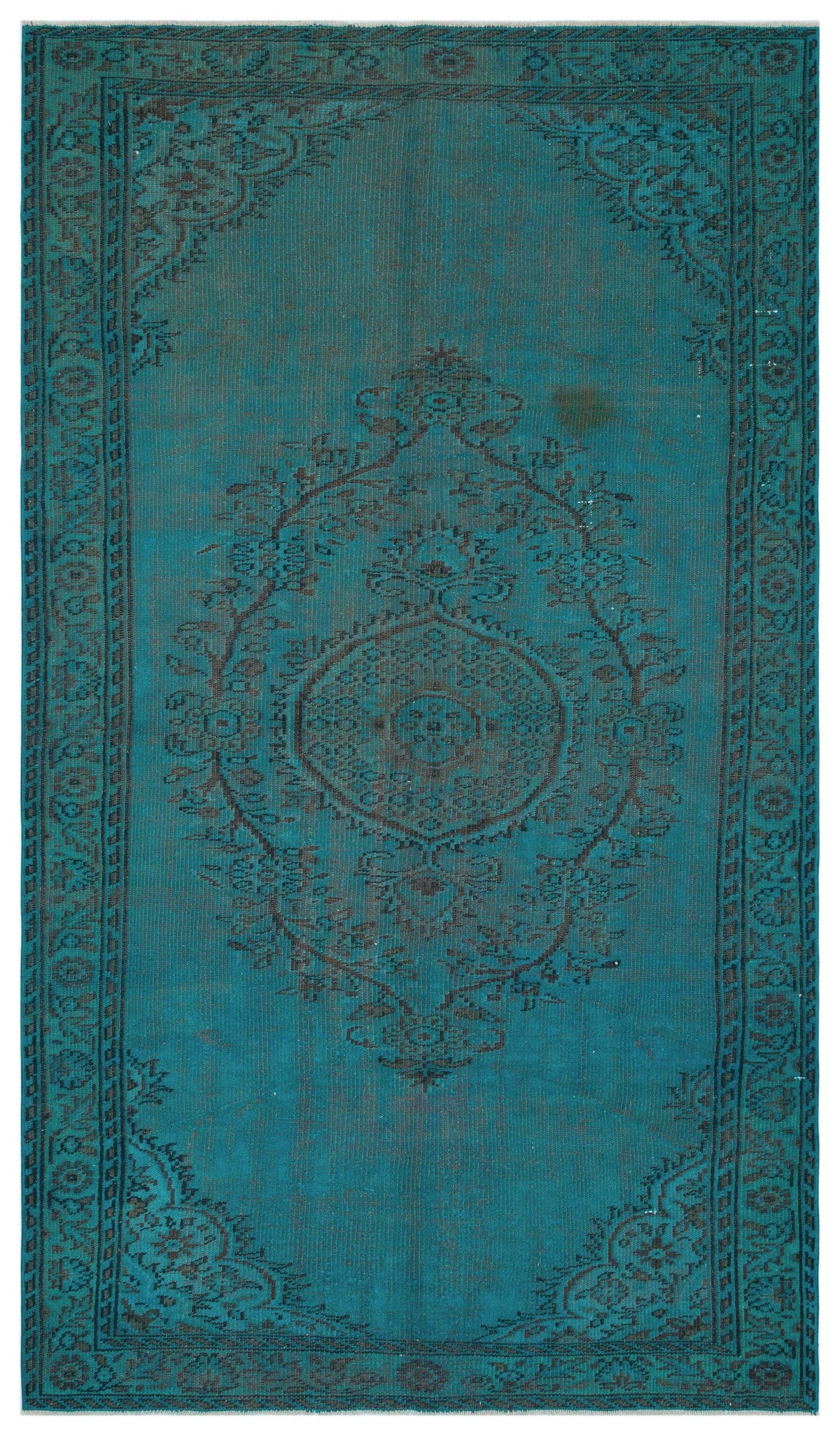 Teal and charcoal distressed rug with a central floral medallion and ornate border pattern.