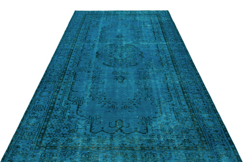 Load image 1 in gallery view. Teal distressed area rug with a traditional central medallion and ornate border pattern on a white background.