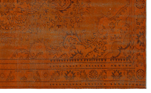 Load image 1 in gallery view. Burnt orange rug with a distressed traditional floral medallion pattern and a detailed geometric border.