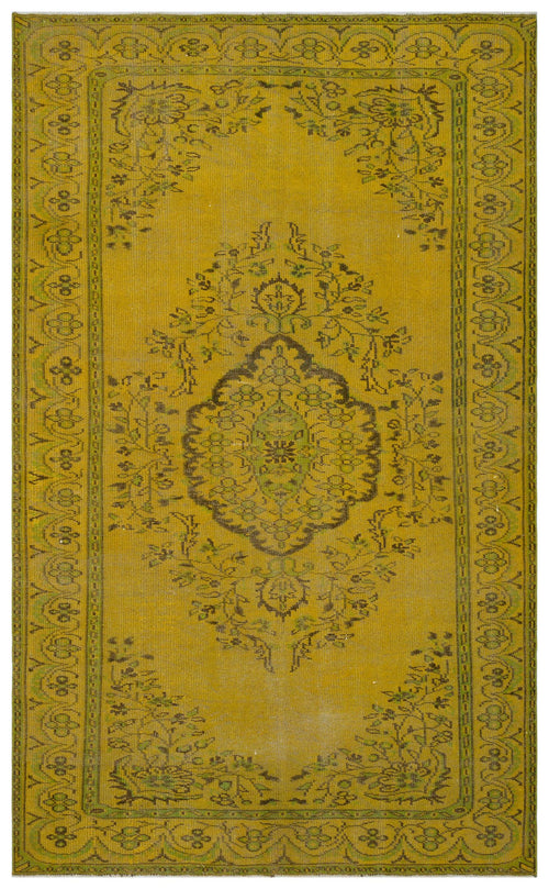 Load image 1 in gallery view. Mustard yellow traditional rug with a central dark floral medallion and a repeating geometric border.