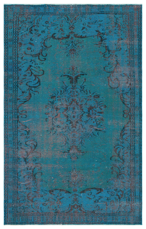 Load image 1 in gallery view. Teal distressed rug with a dark brown central medallion and ornate floral border on a white background.