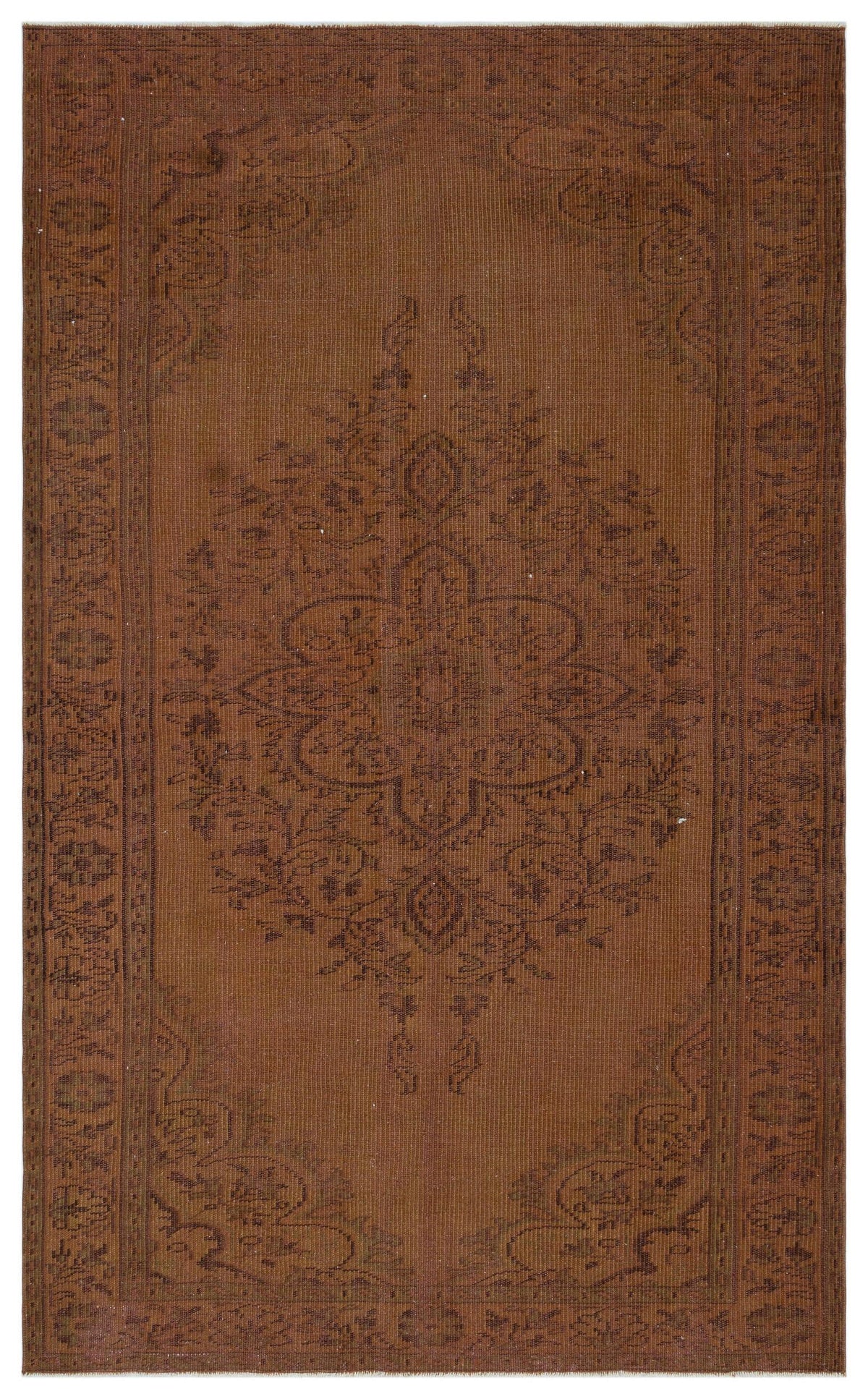Monochromatic rust-brown rug with a faded central floral medallion and a decorative border.