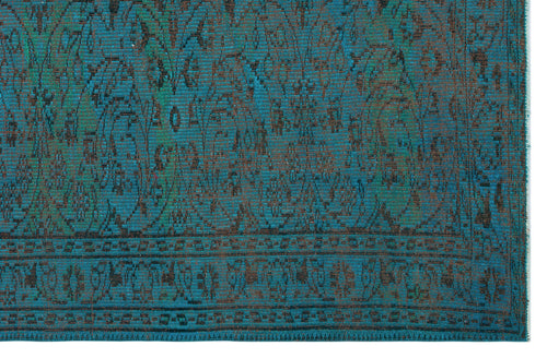 Load image 1 in gallery view. Teal and black rug with a distressed traditional floral medallion pattern and a geometric border.