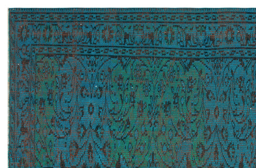 Load image 1 in gallery view. Teal and black rug with a traditional floral medallion pattern and a geometric border.