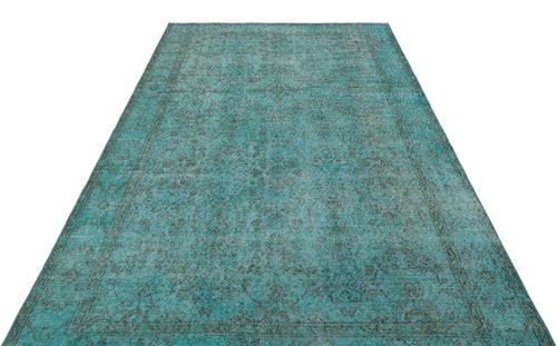 Load image 1 in gallery view. Teal and dark grey distressed rug with a traditional ornate medallion pattern on a white background.