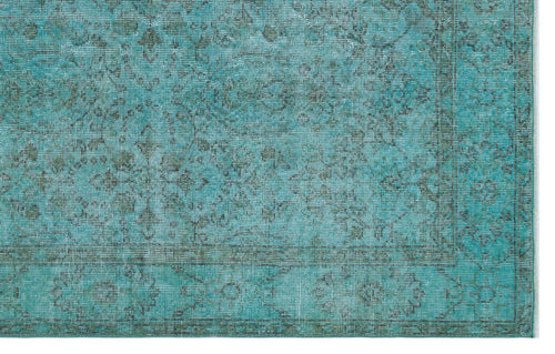 Load image 1 in gallery view. Teal and charcoal distressed rug with a traditional floral medallion pattern and a detailed border.
