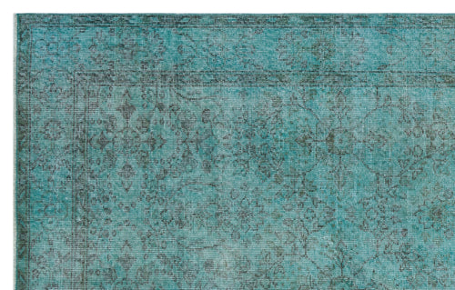Load image 1 in gallery view. Teal and charcoal distressed rug with a traditional floral medallion pattern and a detailed border.