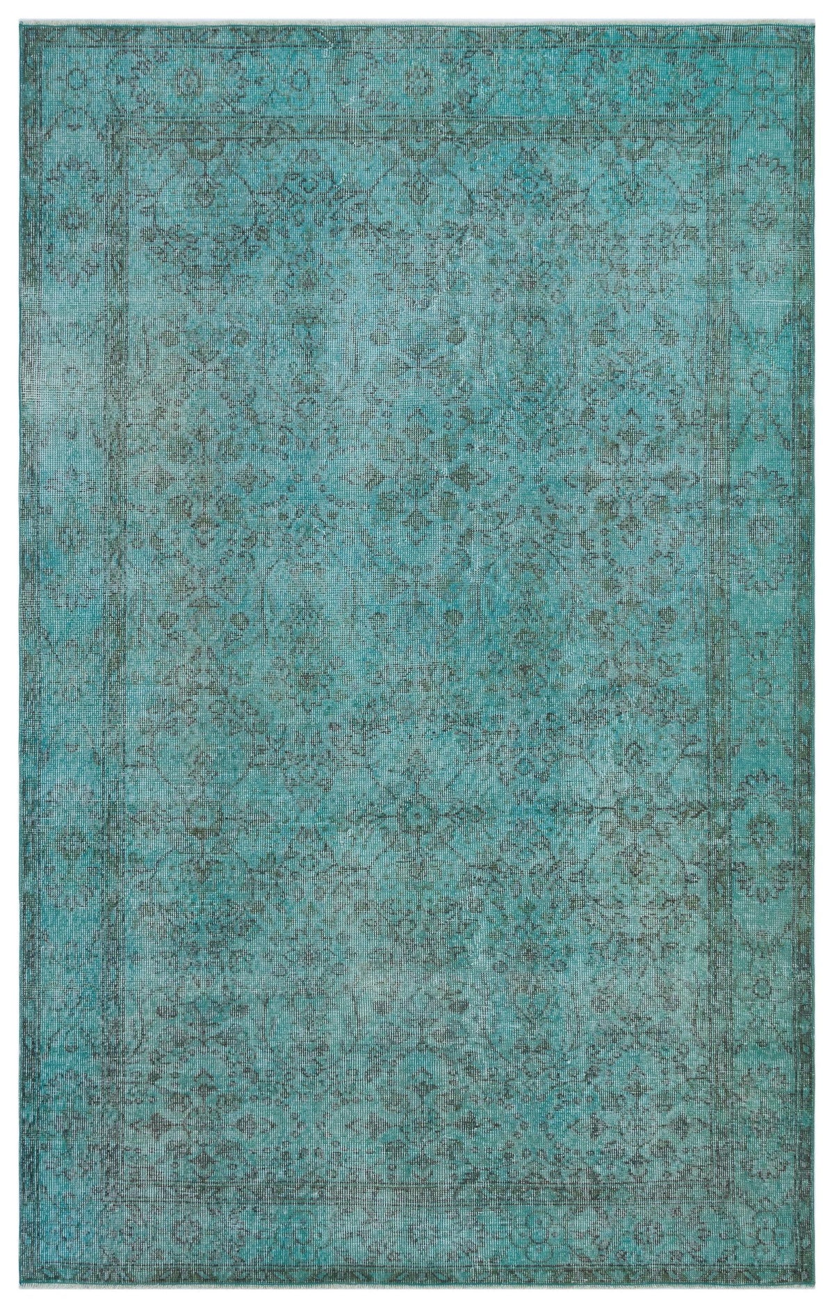 Teal and charcoal distressed traditional rug with a faded floral medallion pattern and a bordered edge.