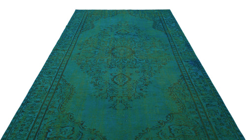 Load image 1 in gallery view. Teal and dark green traditional rug with a distressed central medallion and ornate border on a white background.
