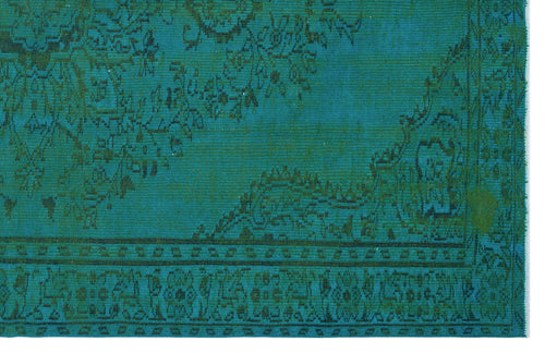 Load image 1 in gallery view. Teal and dark green rug with a traditional distressed floral medallion pattern and a detailed border.