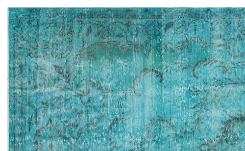 Load image 1 in gallery view. Teal rug with a distressed, faded floral pattern and dark grey outlines on a white background.