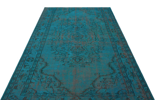 Load image 1 in gallery view. Teal and dark brown distressed rug with a traditional central medallion and ornate border pattern.
