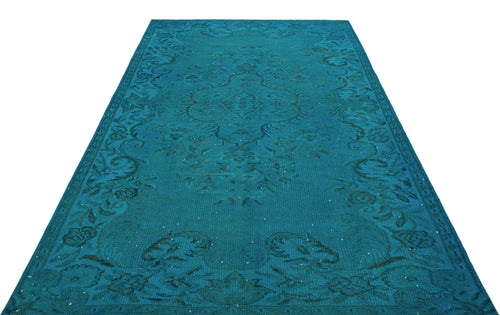 Load image 1 in gallery view. Teal area rug with a dark blue traditional floral medallion pattern and distressed finish on a white background.