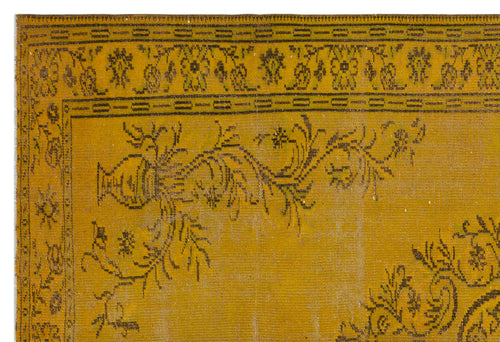 Load image 1 in gallery view. Mustard yellow rug with a dark brown floral and urn motif in a traditional border pattern.