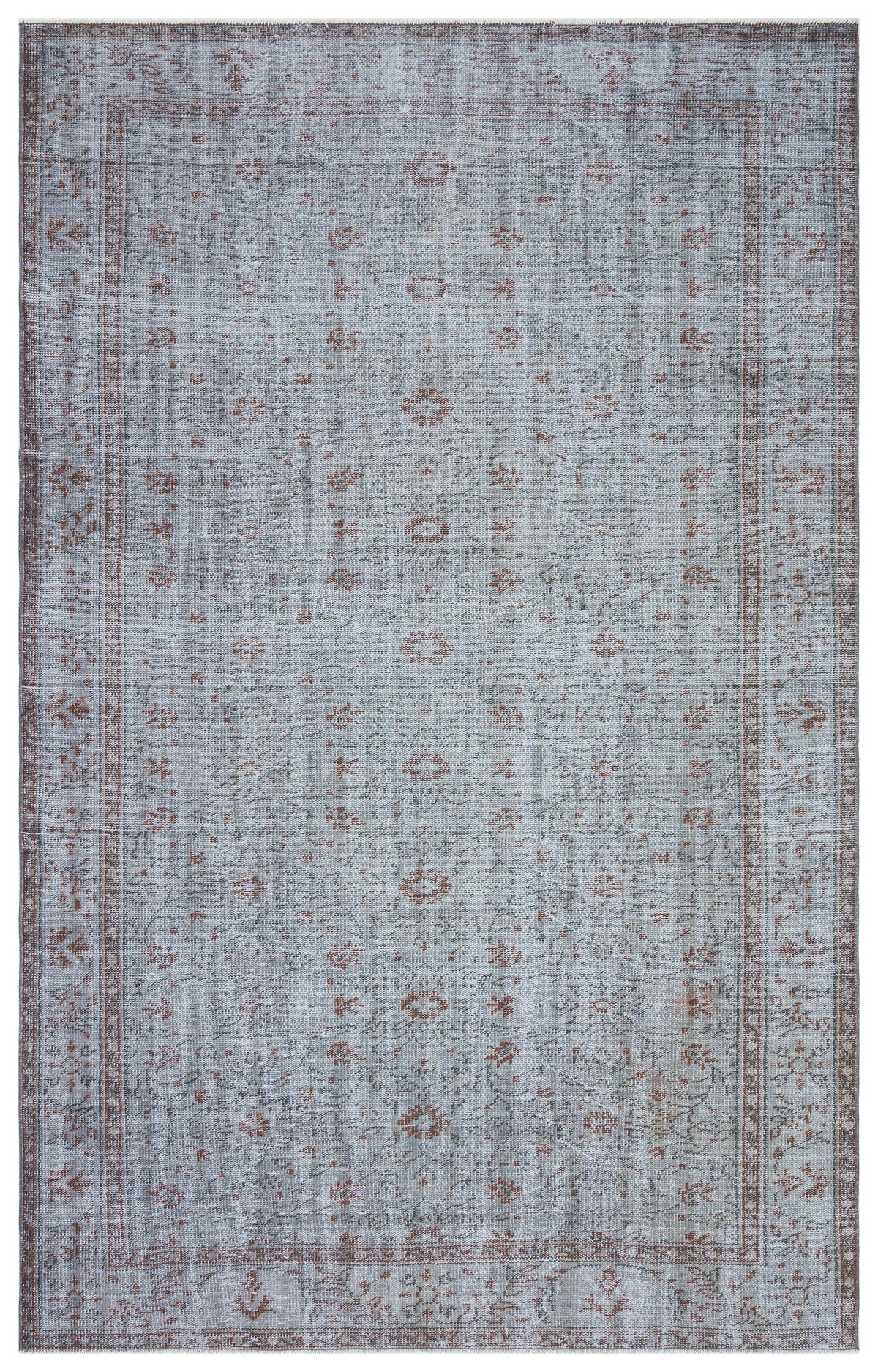 Grey and faded rust transitional rug with a distressed floral medallion pattern and a decorative border.