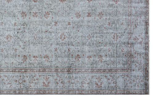 Load image 1 in gallery view. Distressed light gray rug with a faded rust-colored floral medallion pattern and a bordered edge.