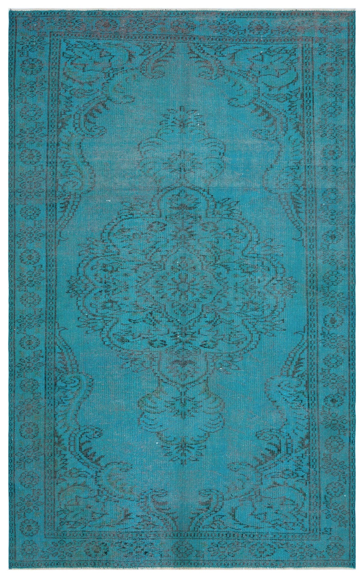 Teal rug with a distressed black traditional floral medallion pattern and a decorative border.