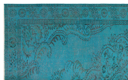 Load image 1 in gallery view. Teal rug with a dark, distressed traditional floral medallion pattern and a decorative border.