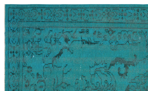 Load image 1 in gallery view. Teal rug with a black distressed traditional floral medallion pattern and a detailed border.