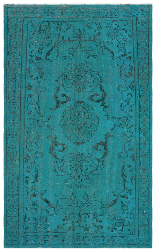 Load image 1 in gallery view. Teal rug with a distressed black floral medallion pattern and a decorative border.