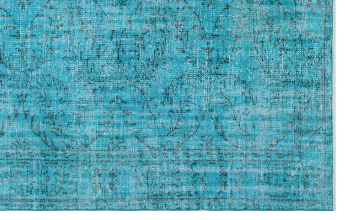 Load image 1 in gallery view. Turquoise rug with a distressed, faded traditional medallion pattern and a dark border.