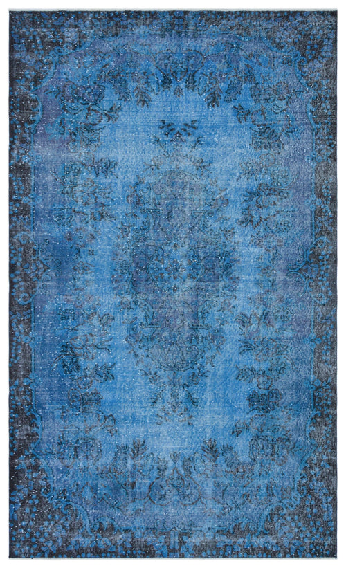 Load image 1 in gallery view. Blue and black distressed traditional rug with a central floral medallion and ornate border pattern.