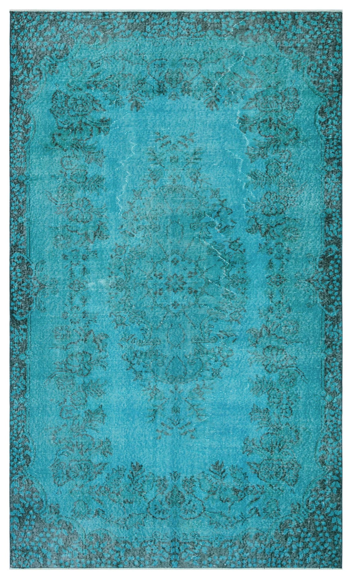Turquoise and black distressed rug with a traditional floral medallion pattern and ornate border.