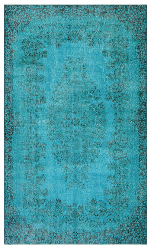 Load image 1 in gallery view. Turquoise and black distressed rug with a traditional floral medallion pattern and ornate border.