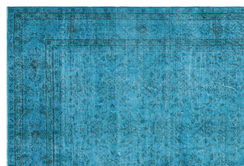 Load image 1 in gallery view. Teal distressed rug with a dark blue traditional floral border and central medallion pattern.