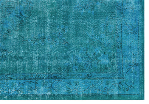 Load image 1 in gallery view. Teal distressed rug with a faded floral medallion pattern and a decorative border.