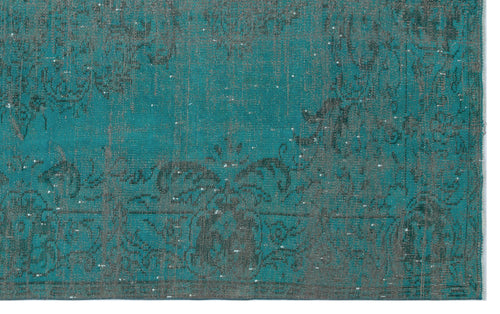 Load image 1 in gallery view. Teal and charcoal distressed rug with a faded traditional floral medallion pattern.