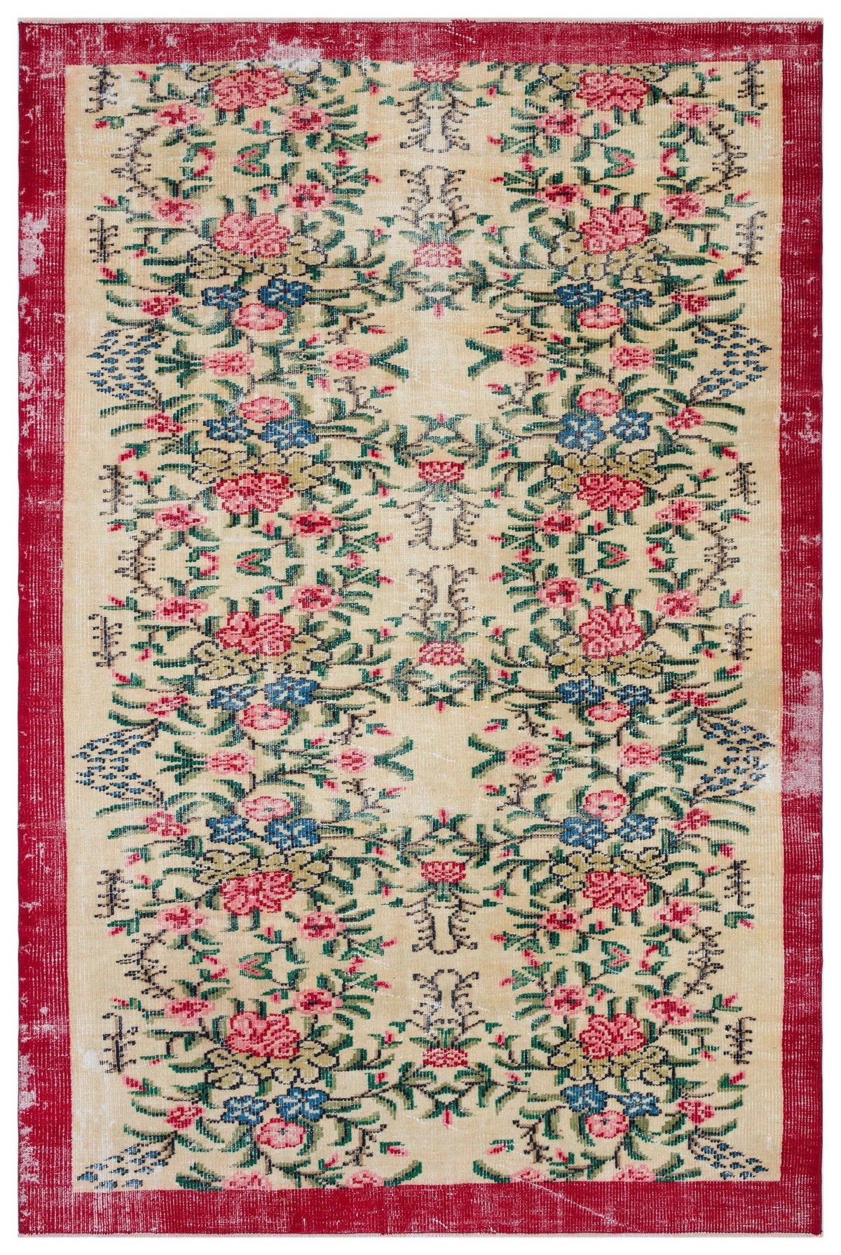 Beige vintage-style rug with a red border and a repeating floral pattern in pink, blue, and green.