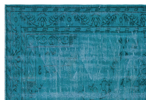 Load image 1 in gallery view. Teal and light blue distressed rug with a traditional border and faded ornamental pattern on a white background.