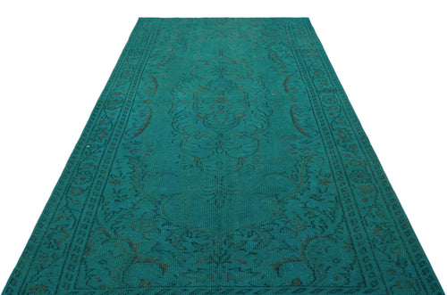 Load image 1 in gallery view. Teal vintage-style rug with a dark brown distressed floral medallion pattern on a white background.