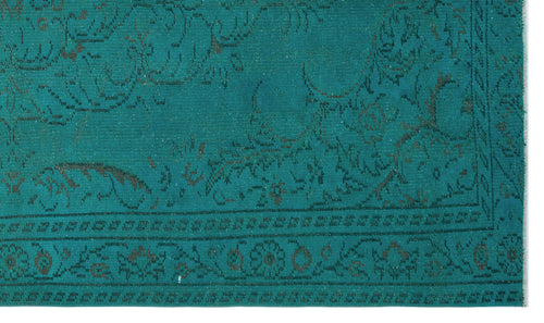 Load image 1 in gallery view. Teal rug with a dark grey distressed floral medallion pattern and a decorative border.
