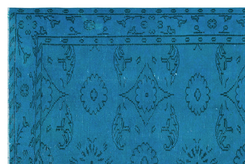 Load image 1 in gallery view. Bright blue rug with a dark blue traditional floral medallion pattern and a geometric border.