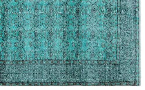 Load image 1 in gallery view. Teal and charcoal distressed rug with a traditional medallion pattern and a geometric border.