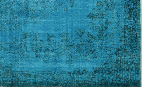 Load image 1 in gallery view. Teal and dark blue distressed rug with a traditional floral medallion pattern and ornate border.