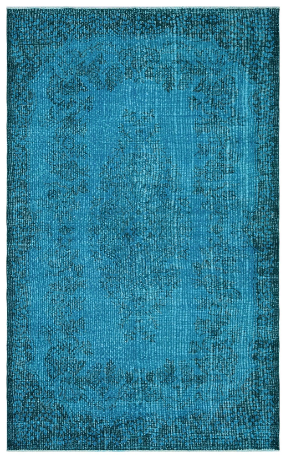 Monochromatic teal rug with a distressed traditional floral medallion pattern and a decorative border.