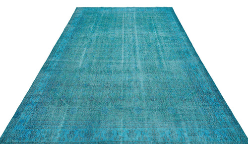 Load image 1 in gallery view. Teal distressed vintage-style rug with a faded traditional medallion pattern on a white background.