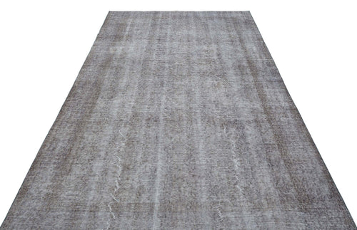 Load image 1 in gallery view. Charcoal and grey distressed vintage-style rug with a subtle, faded linear texture on a white background.