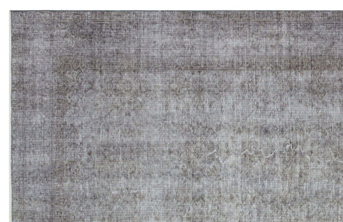 Load image 1 in gallery view. Charcoal and grey distressed rug with a faded traditional medallion pattern.