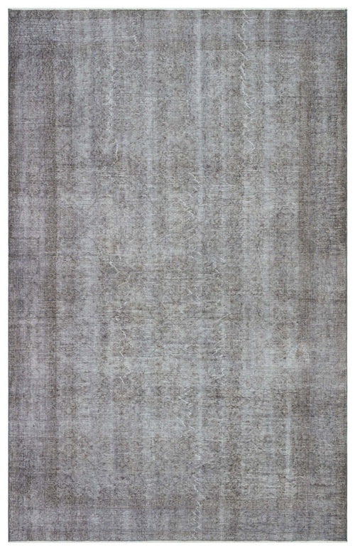 Load image 1 in gallery view. Grey and white distressed rug with a faint, faded central medallion and vertical striped texture.