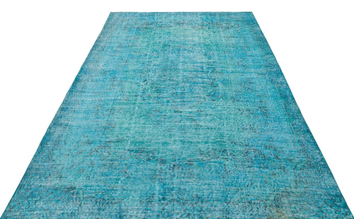 Load image 1 in gallery view. Turquoise distressed vintage-style rug with a faded traditional medallion pattern on a white background.